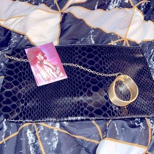 Reb’l fleur Rihanna Clutch Bag